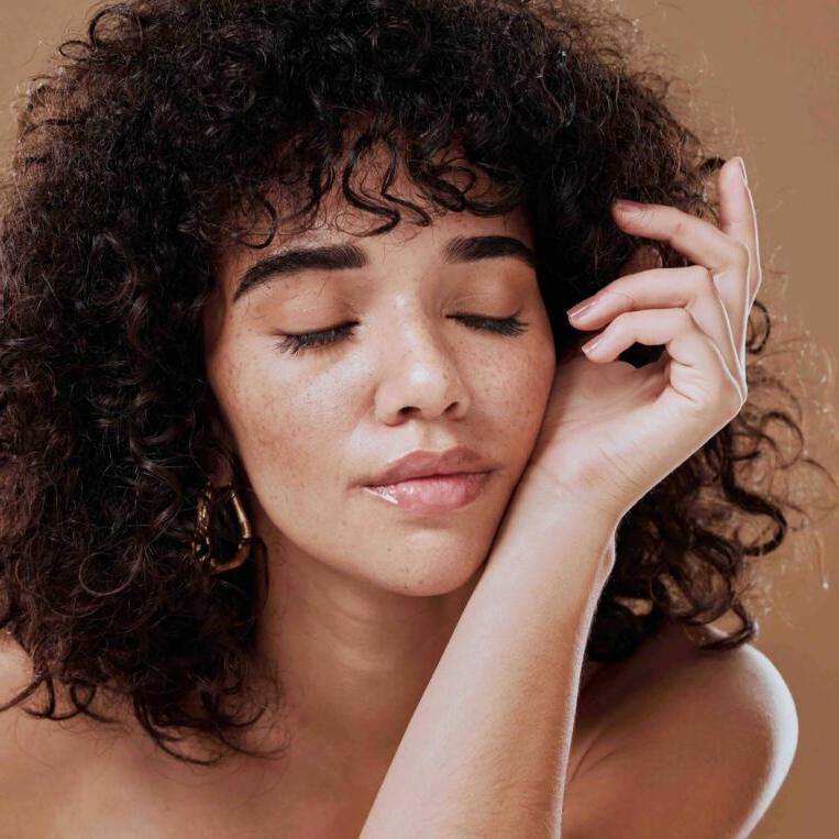 Beautiful patient with hand in hair